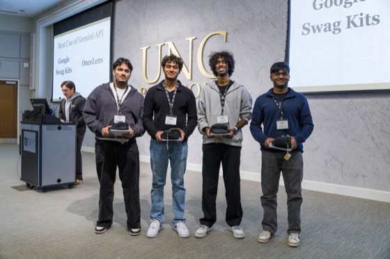 Team OncoLens on stage after winning Best Use of Gemini API